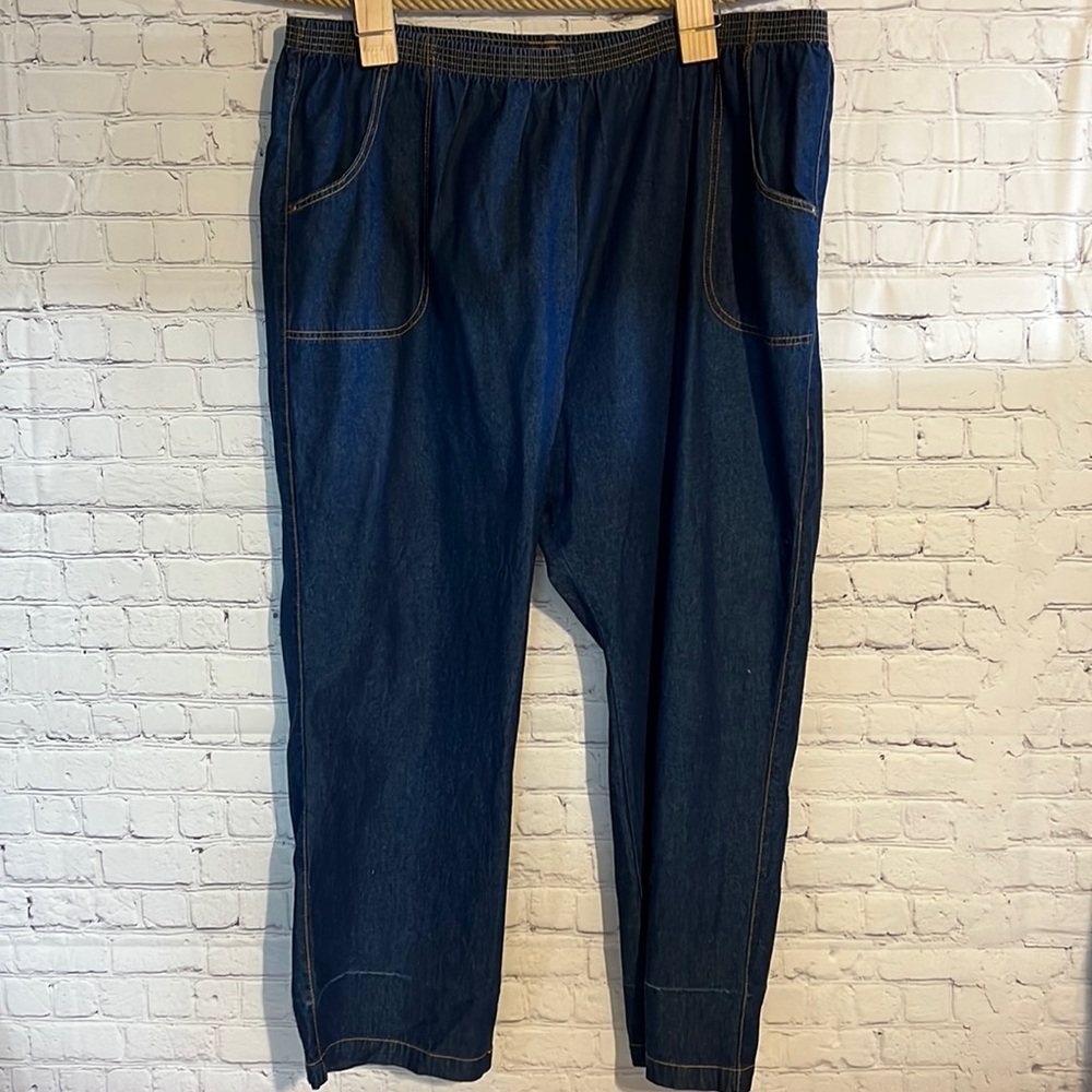 size 42 all elastic waistband pull up jean. Two side slit pockets. Exc condition